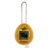 Tamagotchi Nano - Jurassic Park Dinosaur Amber