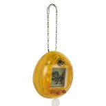 Tamagotchi Nano - Jurassic Park Dinosaur Amber